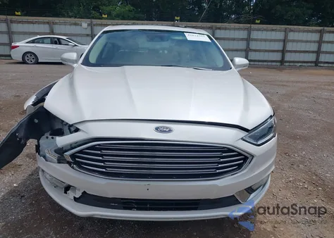 2017 Ford Fusion Hybrid Titanium z USA, uszkodzony, nr VIN 3FA6P0RU1HR203797